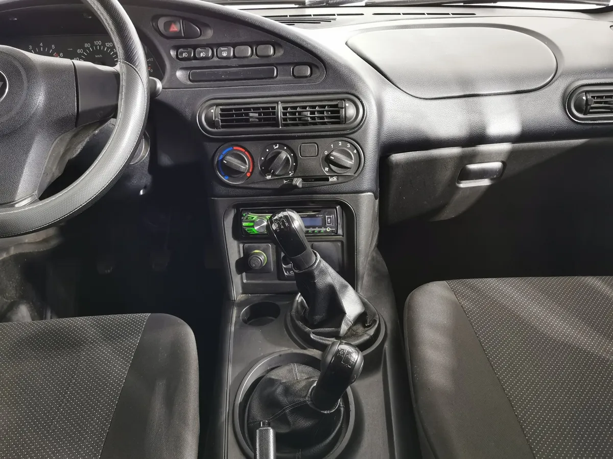 Chevrolet Niva 1.7 MT (80 л.с.) Зеленый в АВИЛОН. Слайд №14