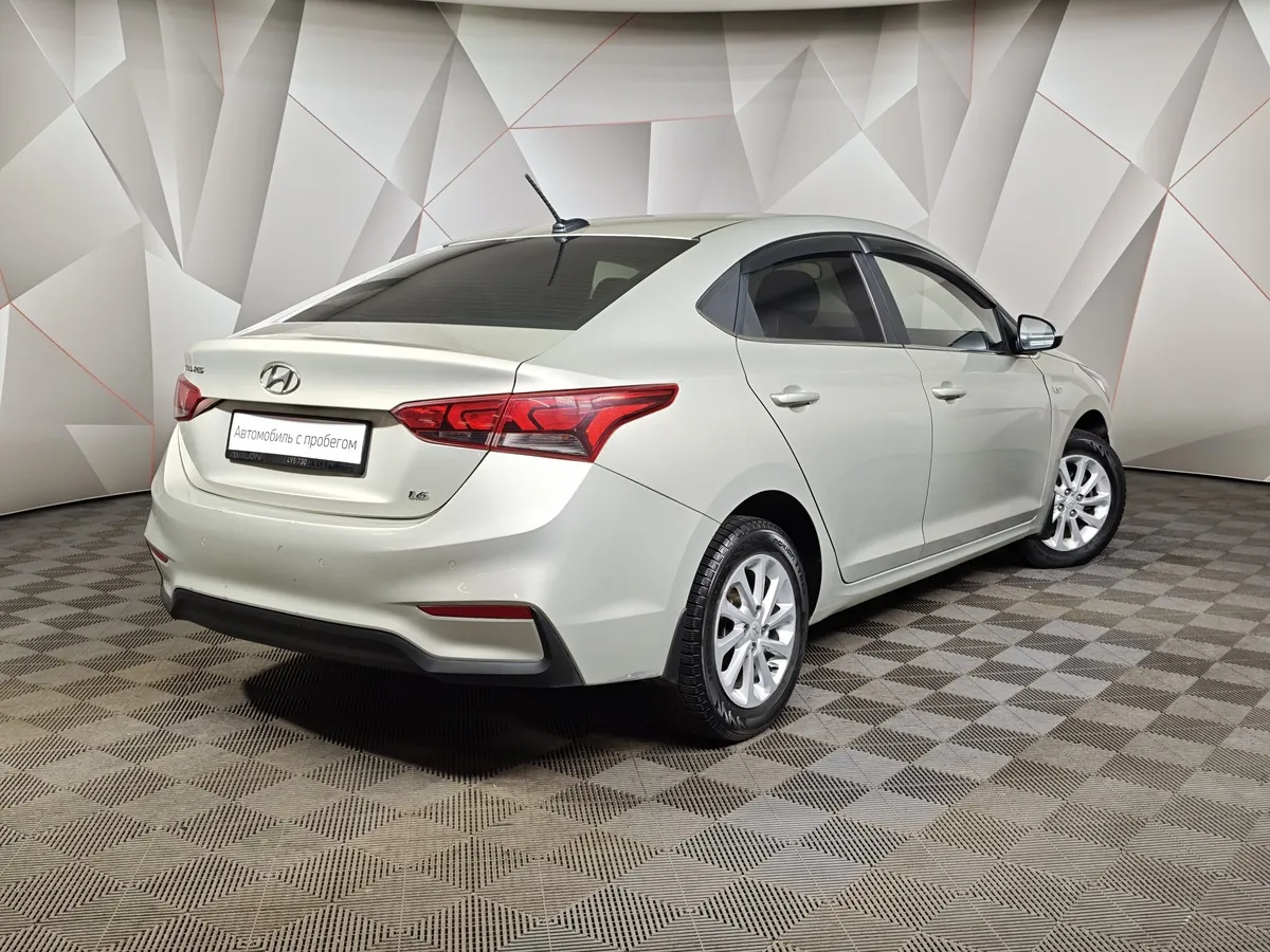 Hyundai Solaris 1.6 AT (123 л.с.) Elegance Бежевый в АВИЛОН. Слайд №2