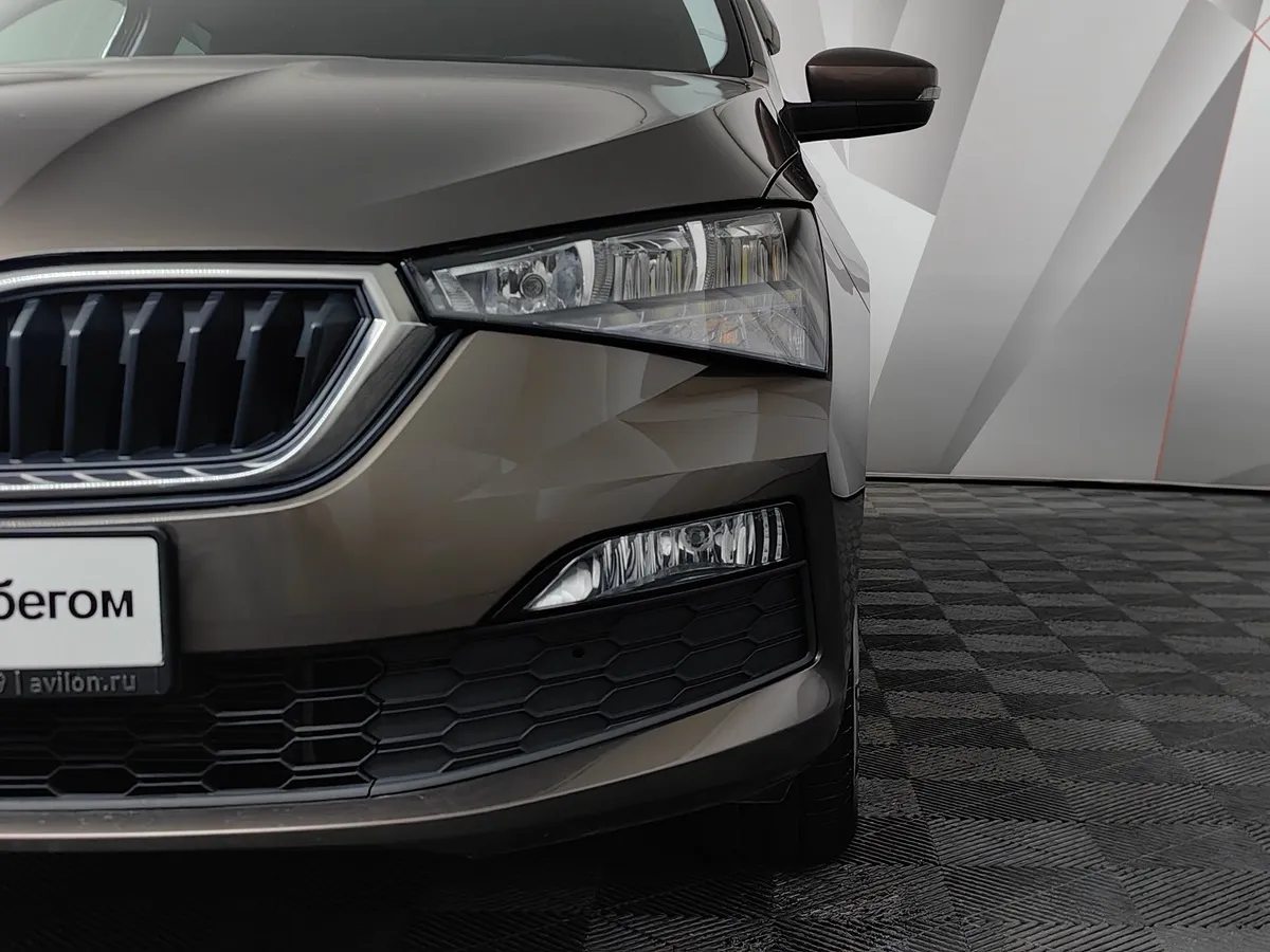Skoda Rapid 1.6 AT (110 л.с.) Белый в АВИЛОН. Слайд №10