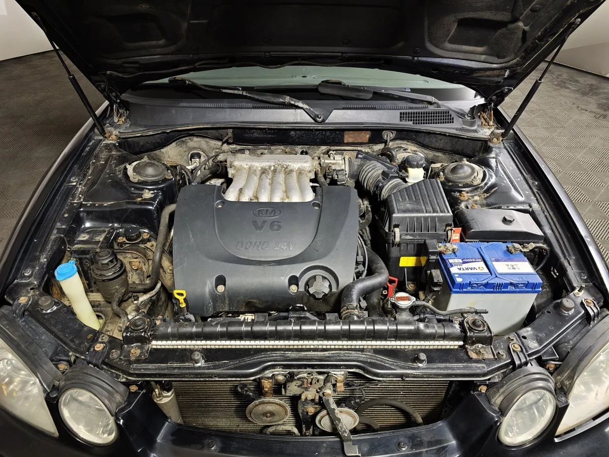 Kia Magentis 2.5 AT (166 л.с.) Черный в АВИЛОН. Слайд №10