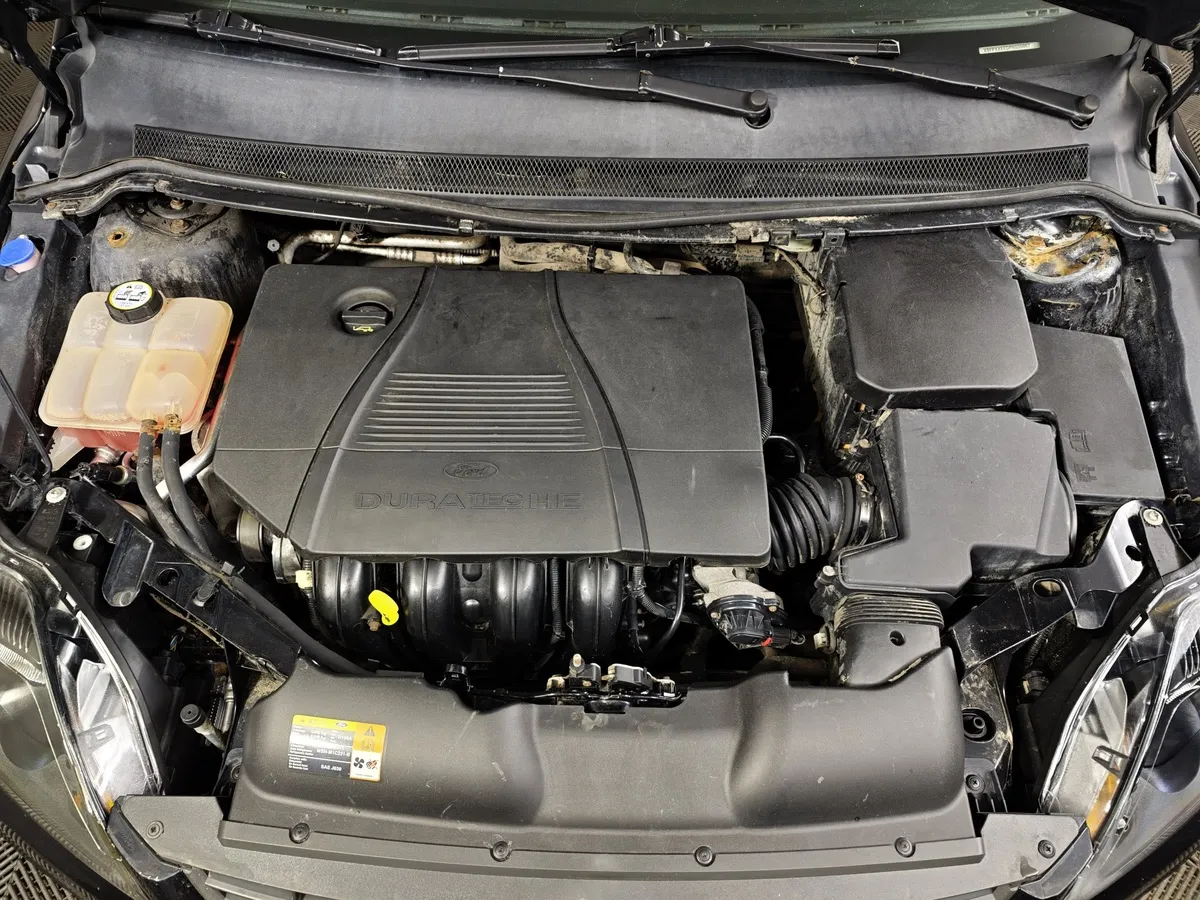 Ford Focus 1.8 MT (125 л.с.) Ghia Черный в АВИЛОН. Слайд №11