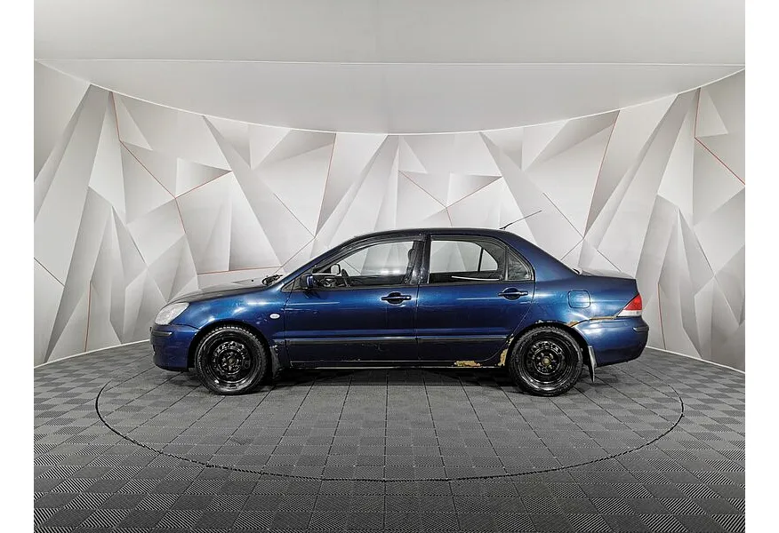 Mitsubishi Lancer 1.6 AT (98 л.с.) Синий в АВИЛОН. Слайд №5