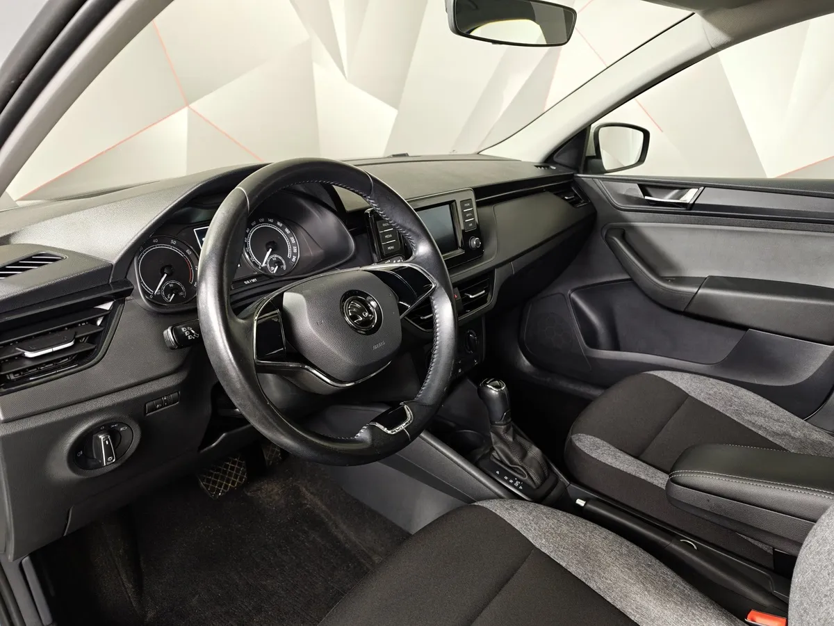 Skoda Rapid 1.6 AT (110 л.с.) Белый в АВИЛОН. Слайд №19