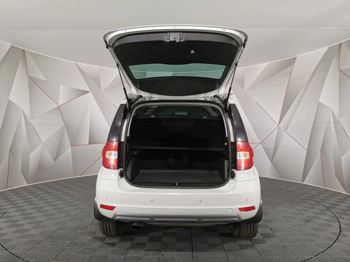 Skoda Yeti 1.6 AT (110 л.с.) Белый в АВИЛОН. Слайд №11