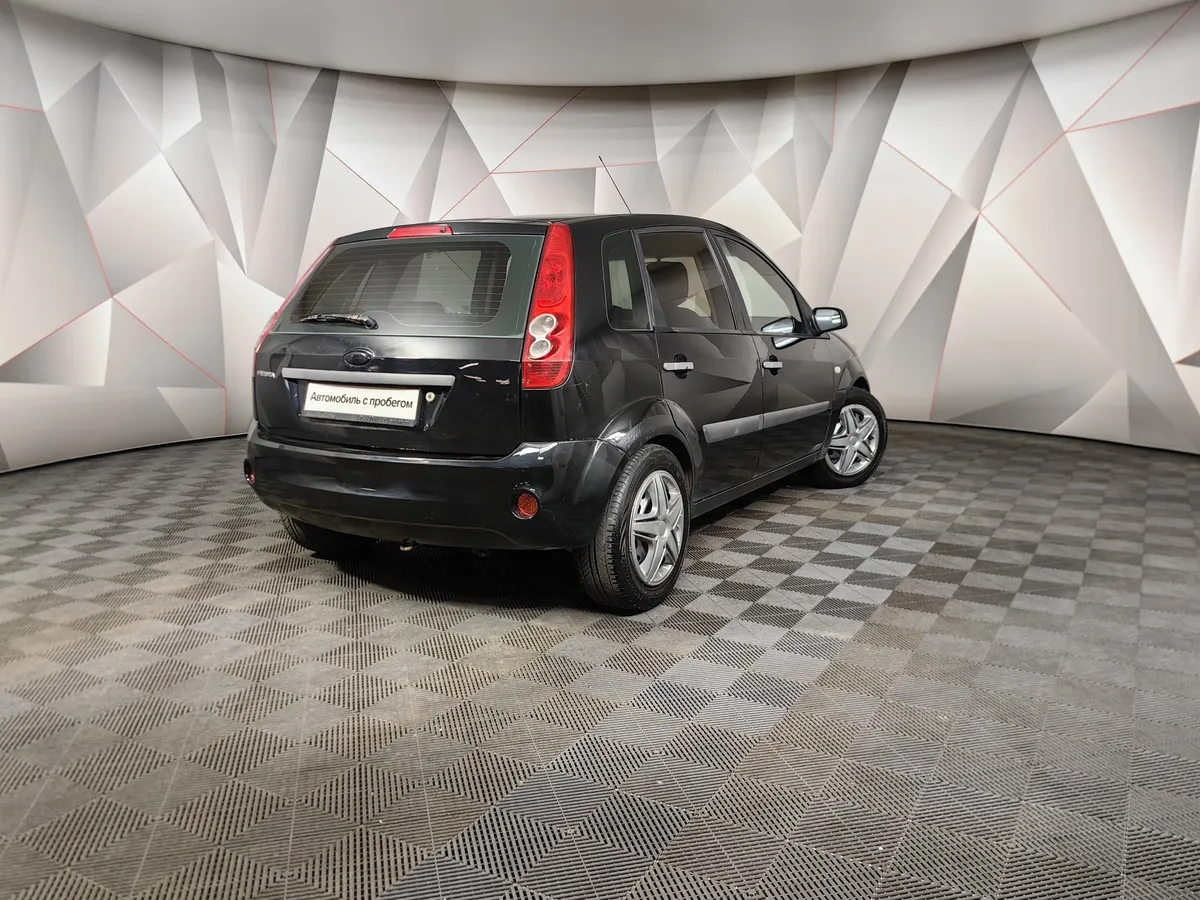 Ford Fiesta 1.4 Durashift EST (79 л.с.) Comfort Черный в АВИЛОН. Слайд №2