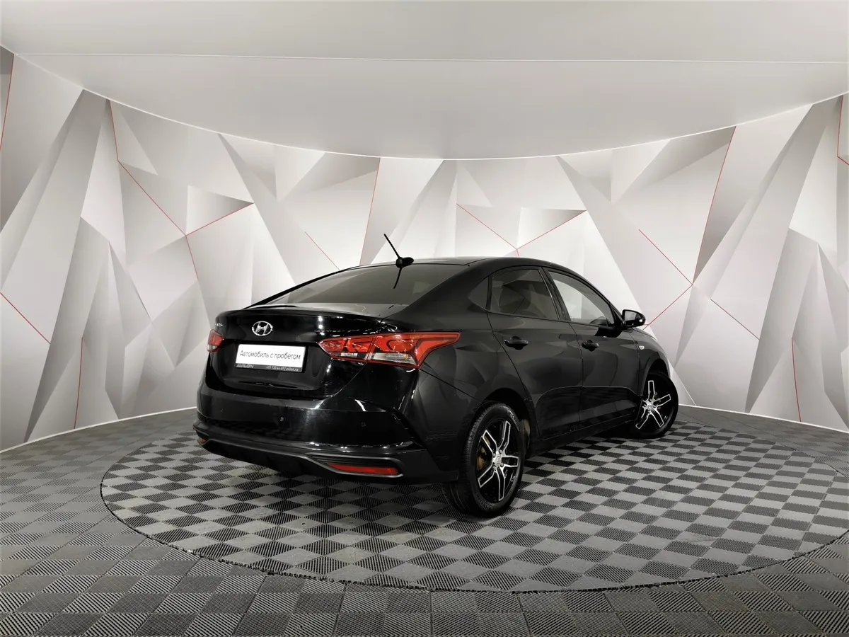 Hyundai Solaris 1.6 AT (123 л.с.) Comfort + Light Черный в АВИЛОН. Слайд №2
