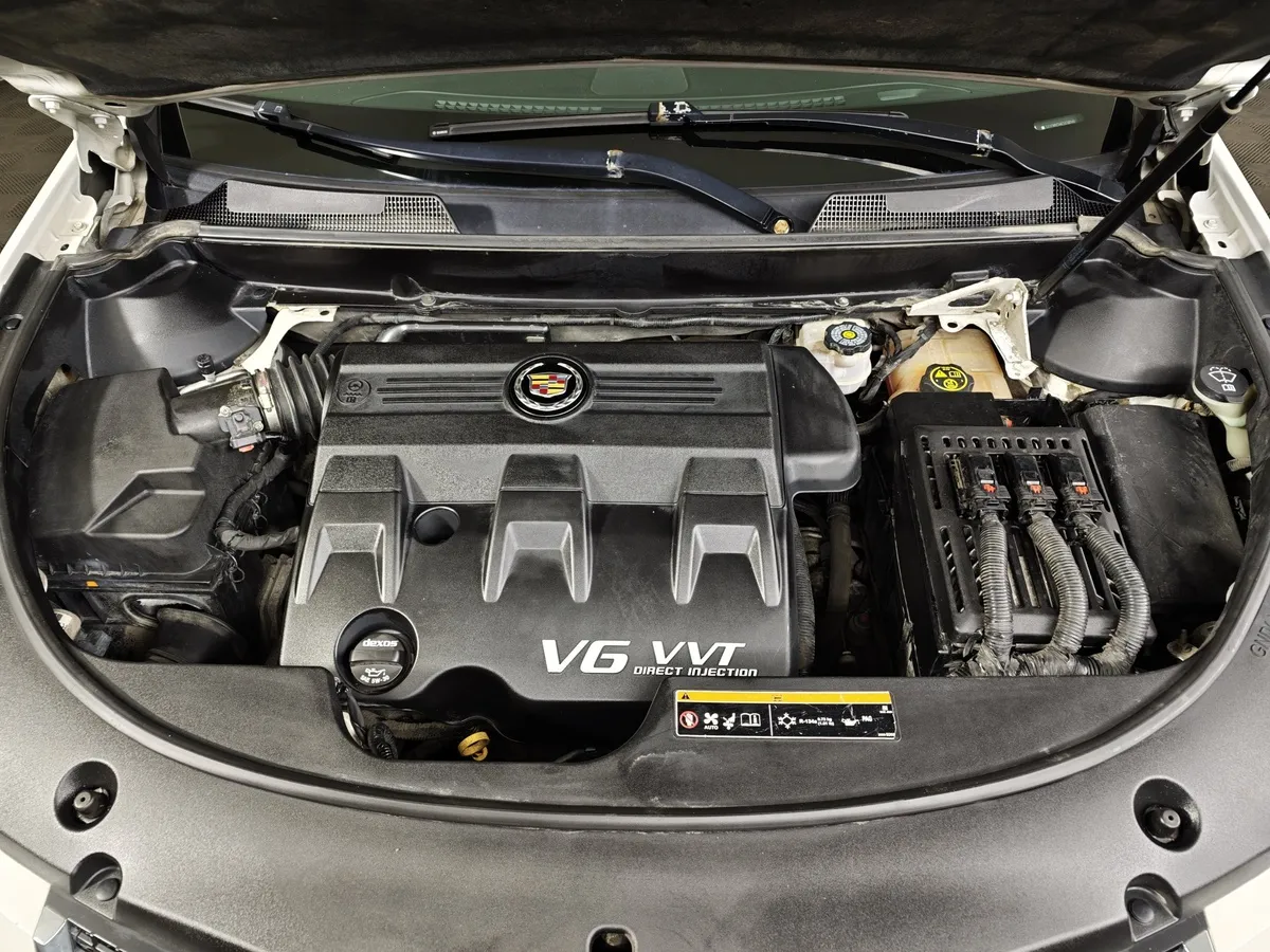 Cadillac SRX 3.6 AT AWD (318 л.с.) Белый в АВИЛОН. Слайд №9