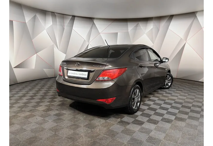 Hyundai Solaris 1.6 AT (123 л.с.) Active Plus Коричневый в АВИЛОН. Слайд №2