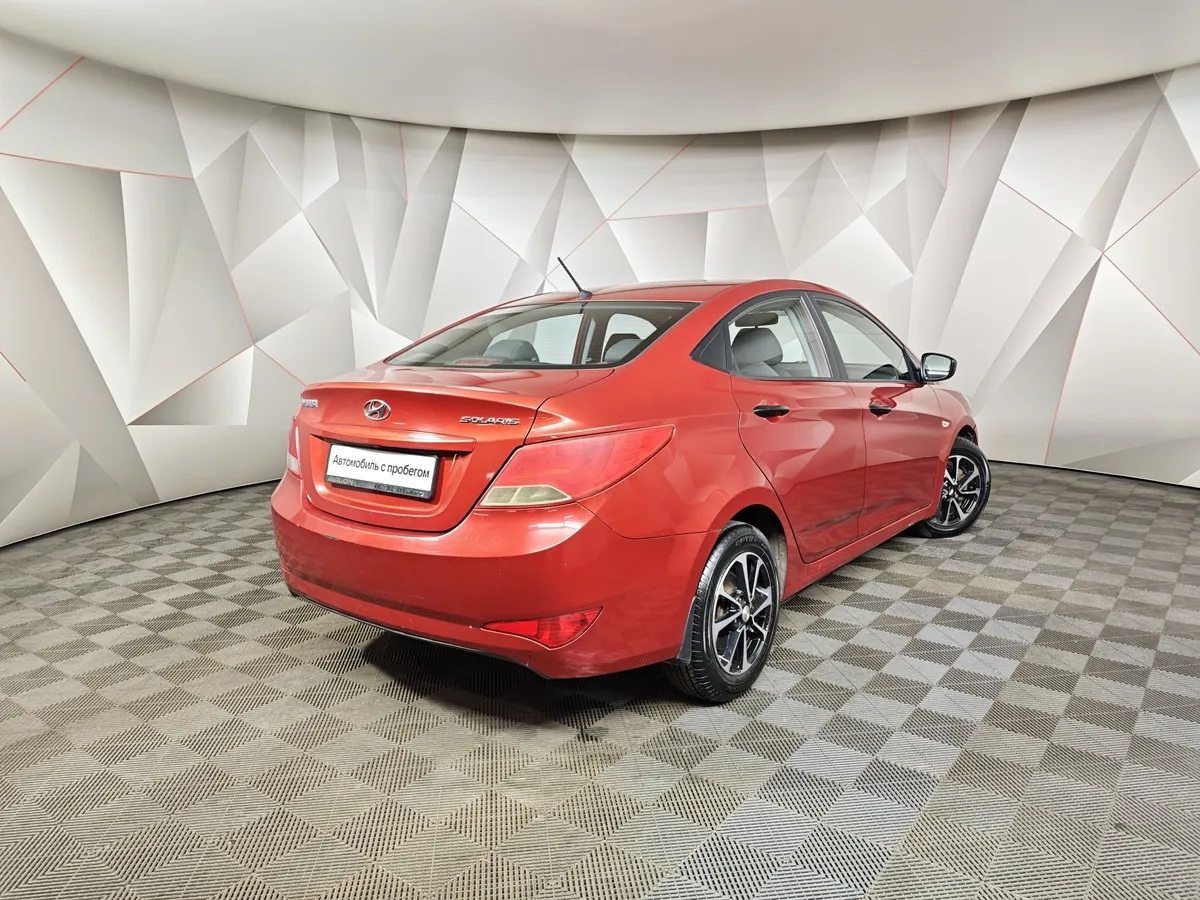 Hyundai Solaris 1.6 AT (123 л.с.) Comfort Красный в АВИЛОН. Слайд №2