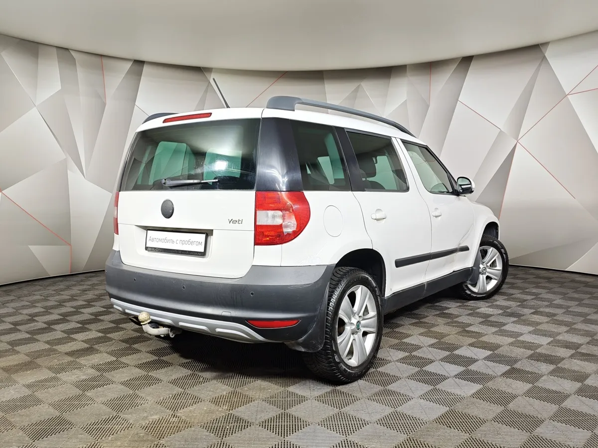 Skoda Yeti 1.2 TSI DSG (105 л.с.) Active Белый в АВИЛОН. Слайд №2