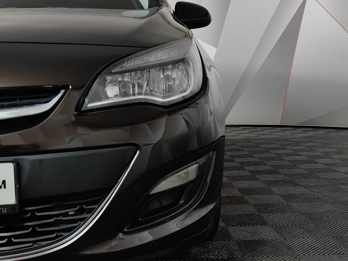 Opel Astra 1.6 MT (115 л.с.) Коричневый в АВИЛОН. Слайд №10