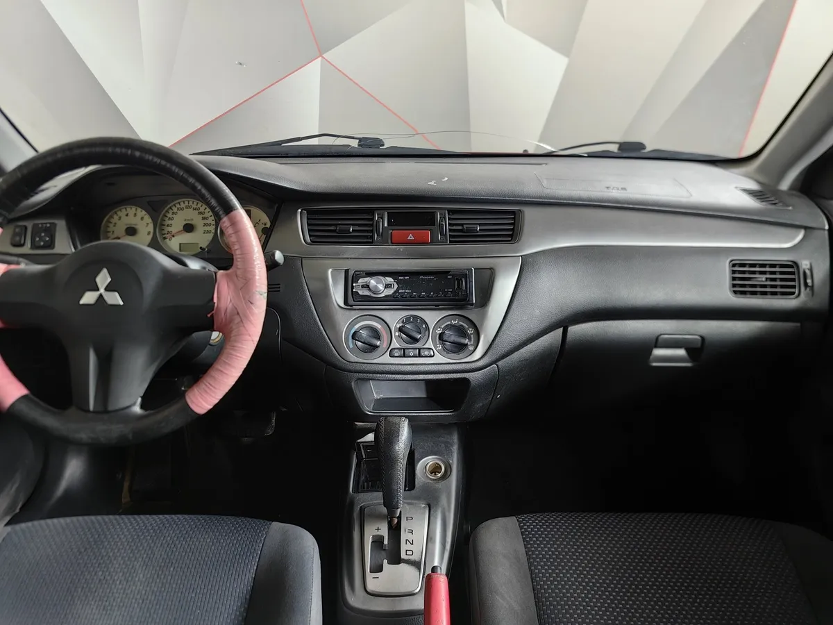 Mitsubishi Lancer 1.6 AT (98 л.с.) Красный в АВИЛОН. Слайд №10