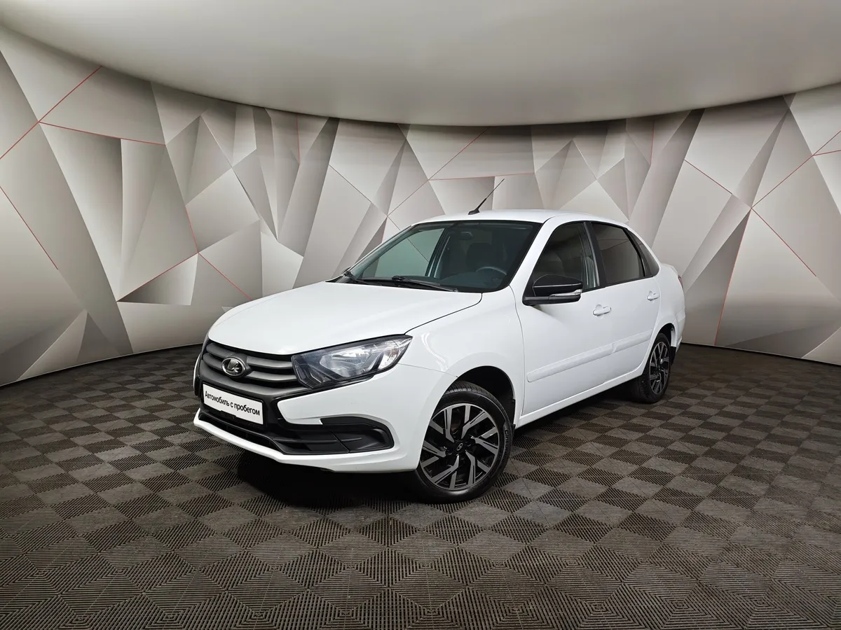 ВАЗ (Lada) Granta 1.6 MT 8кл (87 л.с.) Белый в АВИЛОН. Слайд №1