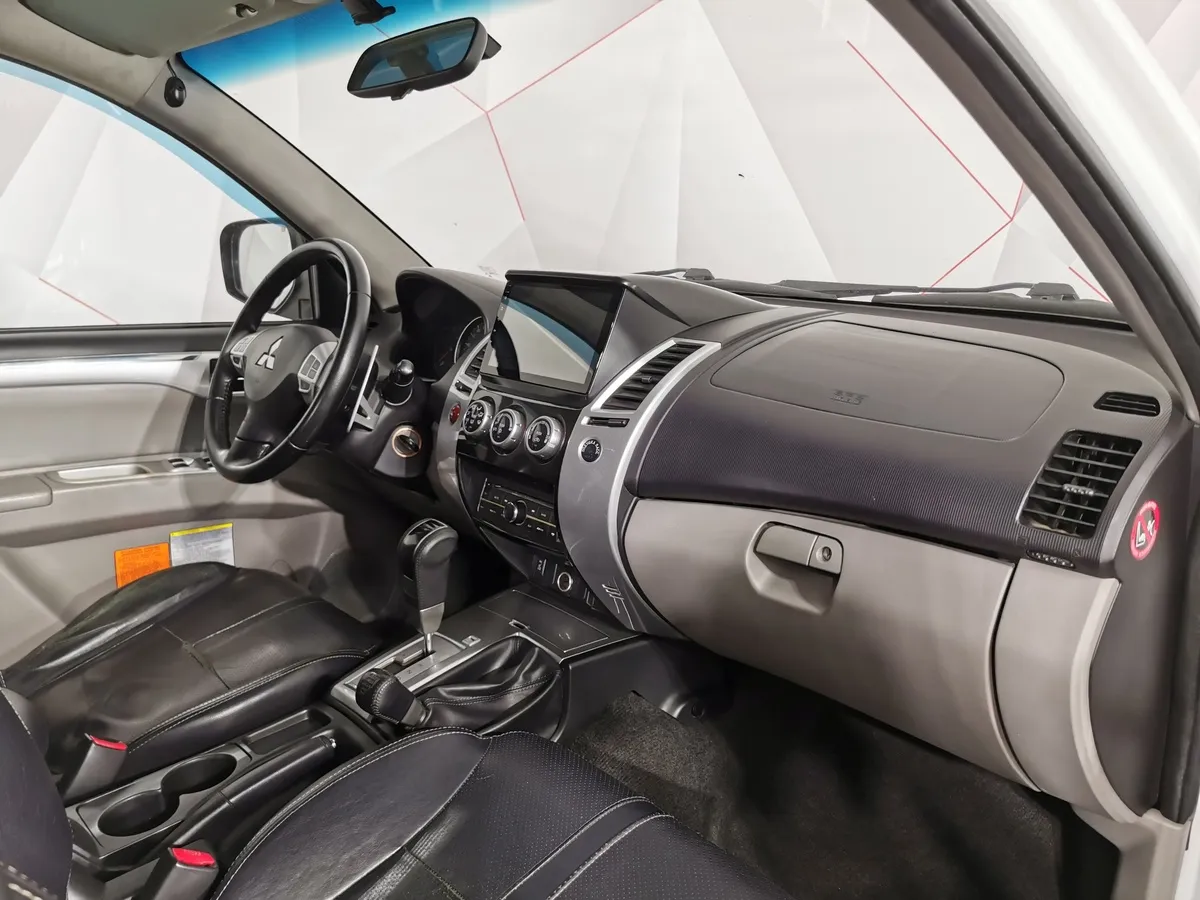 Mitsubishi Pajero Sport 2.5 DI-D AT AWD (178 л.с.) Белый в АВИЛОН. Слайд №12