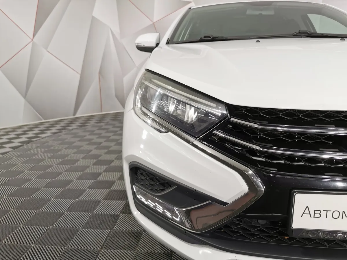 ВАЗ (Lada) Vesta 1.8 CVT (122 л.с.) Enjoy'24 Белый в АВИЛОН. Слайд №10