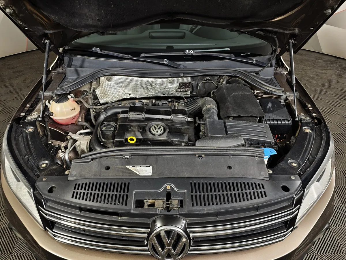 Volkswagen Tiguan 1.4 TSI BlueMotion DSG (150 л.с.) Коричневый в АВИЛОН. Слайд №11