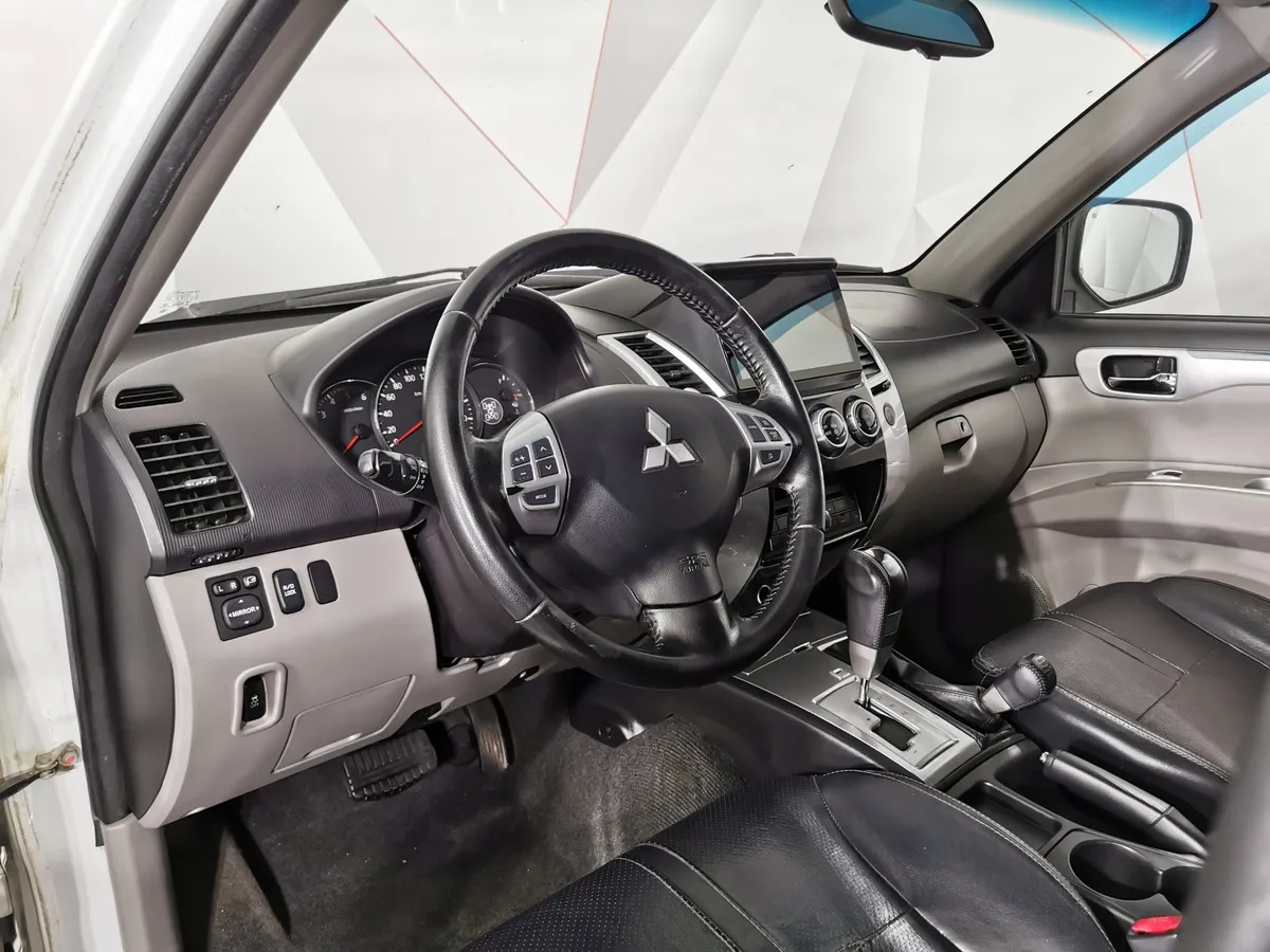 Mitsubishi Pajero Sport 2.5 DI-D AT AWD (178 л.с.) Белый в АВИЛОН. Слайд №18