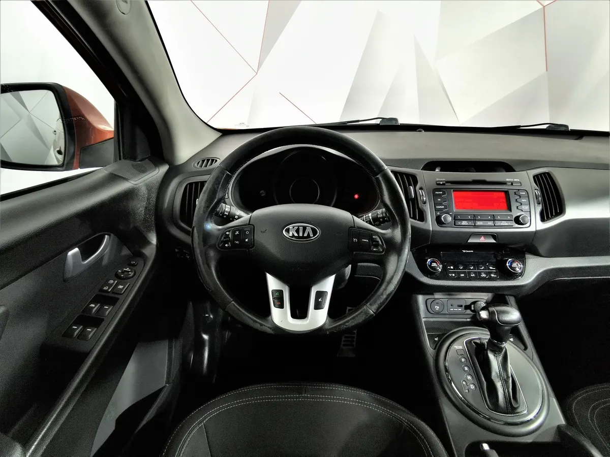 Kia Sportage 2.0 AT 4WD (150 л.с.) Luxe Оранжевый в АВИЛОН. Слайд №18