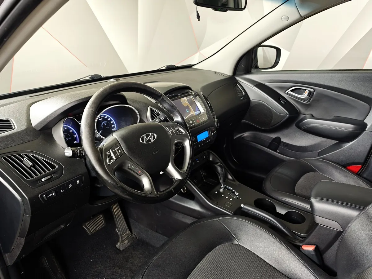 Hyundai ix35 2.0 AT 4WD (150 л.с.) Travel Коричневый в АВИЛОН. Слайд №18