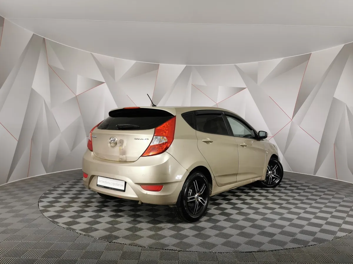 Hyundai Solaris 1.6 AT (123 л.с.) Dynamic Бежевый в АВИЛОН. Слайд №2
