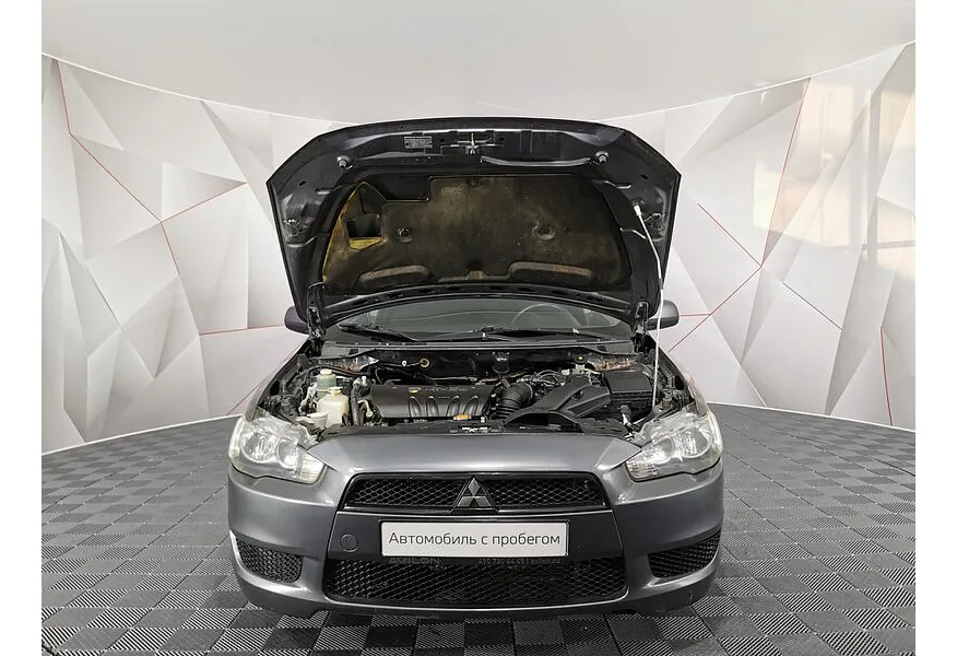 Mitsubishi Lancer 1.8 MT (143 л.с.) Серый в АВИЛОН. Слайд №10