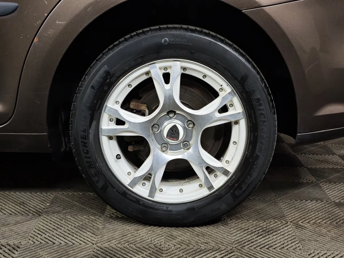 Volkswagen Touran 1.4 TSI DSG (140 л.с.) Trendline Коричневый в АВИЛОН. Слайд №9