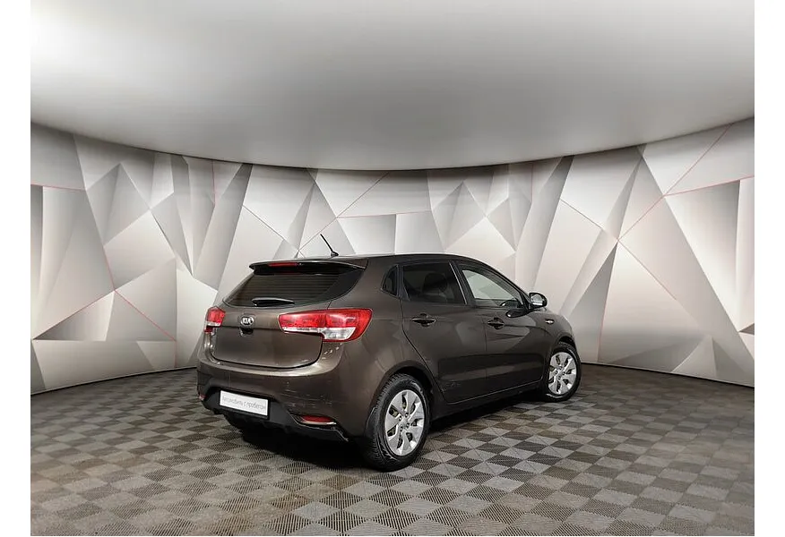 Kia Rio 1.4 AT (107 л.с.) Коричневый в АВИЛОН. Слайд №2