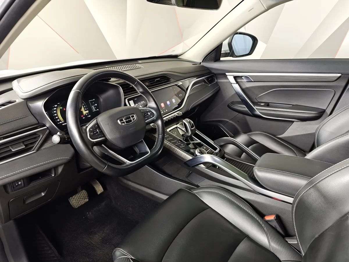 Geely Atlas Pro 1.5T 7DCT AWD (177 л.с.) Flagship Белый в АВИЛОН. Слайд №18