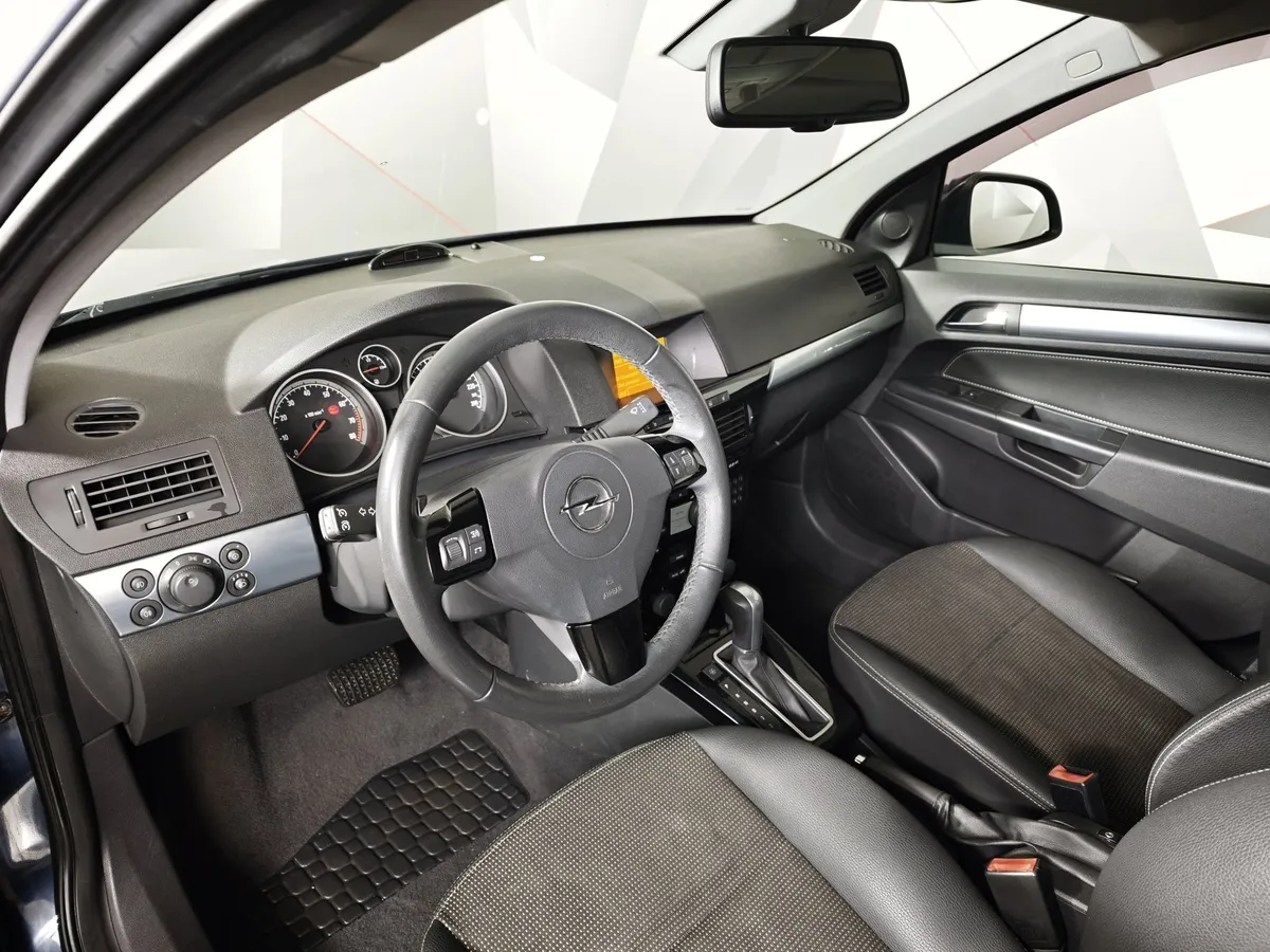 Opel Astra 1.8 AT (140 л.с.) Синий в АВИЛОН. Слайд №19