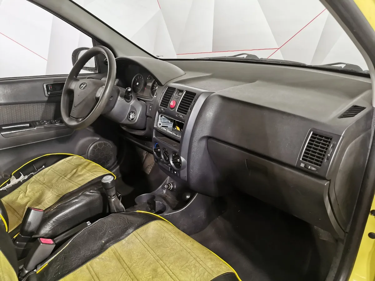 Hyundai Getz 1.4 MT (97 л.с.) Желтый в АВИЛОН. Слайд №10