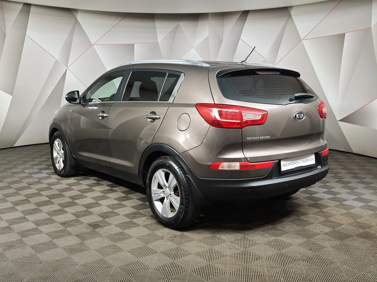 Kia Sportage 2.0 AT 4WD (150 л.с.) Luxe Коричневый в АВИЛОН. Слайд №4