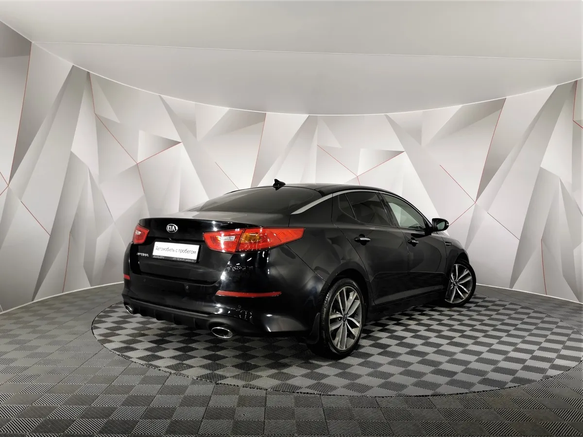 Kia Optima 2.4 MPI AT (180 л.с.) Premium Черный в АВИЛОН. Слайд №2