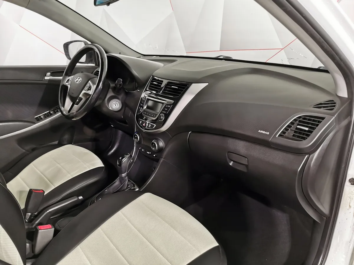Hyundai Solaris 1.6 AT (123 л.с.) Optima Белый в АВИЛОН. Слайд №11