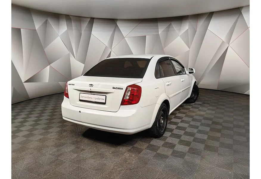Daewoo Gentra 1.5 MT (107 л.с.) Белый в АВИЛОН. Слайд №2