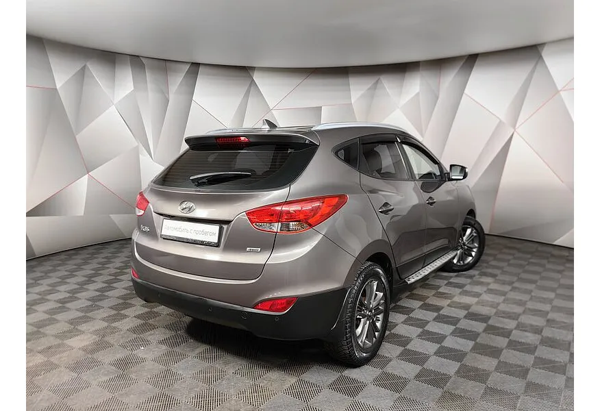 Hyundai ix35 2.0 AT 4WD (150 л.с.) Travel Коричневый в АВИЛОН. Слайд №2