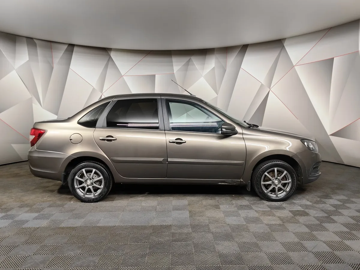 ВАЗ (Lada) Granta 1.6 MT 16 кл (106 л.с.) Коричневый в АВИЛОН. Слайд №6