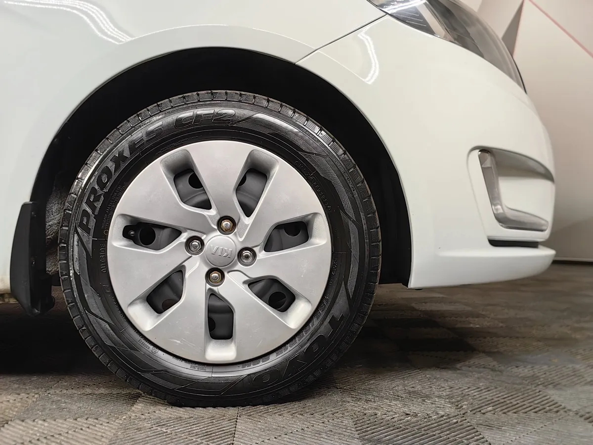 Kia Rio 1.6 MT (123 л.с.) Белый в АВИЛОН. Слайд №9