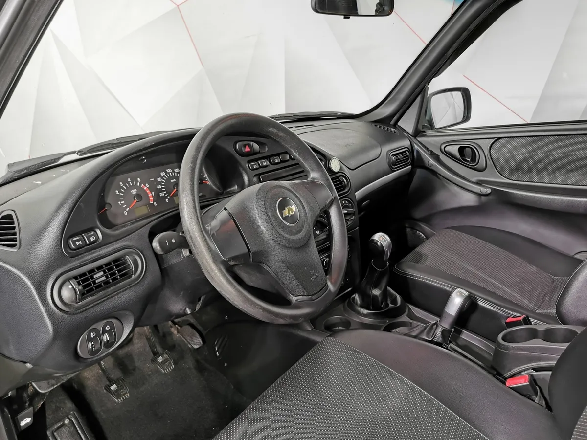 Chevrolet Niva 1.7 MT (80 л.с.) Коричневый в АВИЛОН. Слайд №18