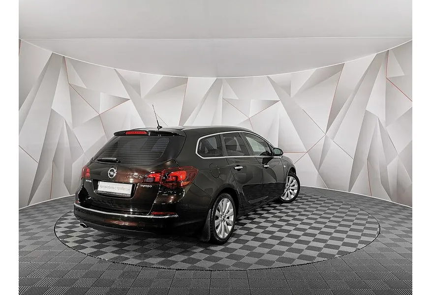 Opel Astra 1.4 Turbo AT (140 л.с.) Коричневый в АВИЛОН. Слайд №2