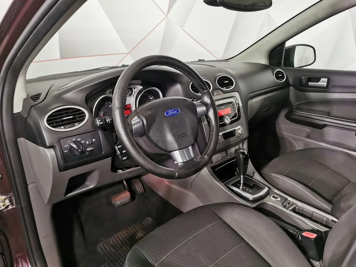 Ford Focus 1.6 AT (101 л.с.) Titanium Фиолетовый в АВИЛОН. Слайд №16