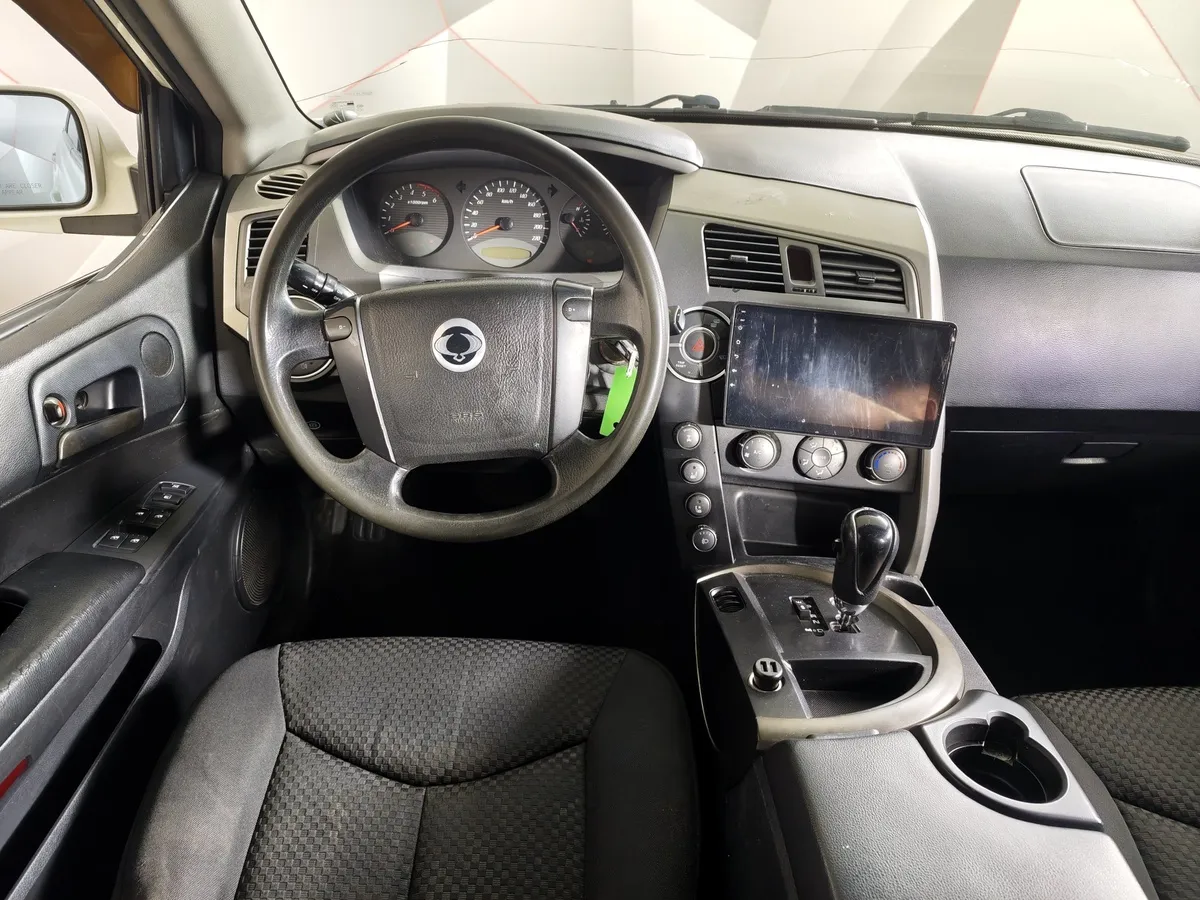 SsangYong Kyron 2.0 Xdi E-Tronic 4WD (141 л.с.) Белый в АВИЛОН. Слайд №17