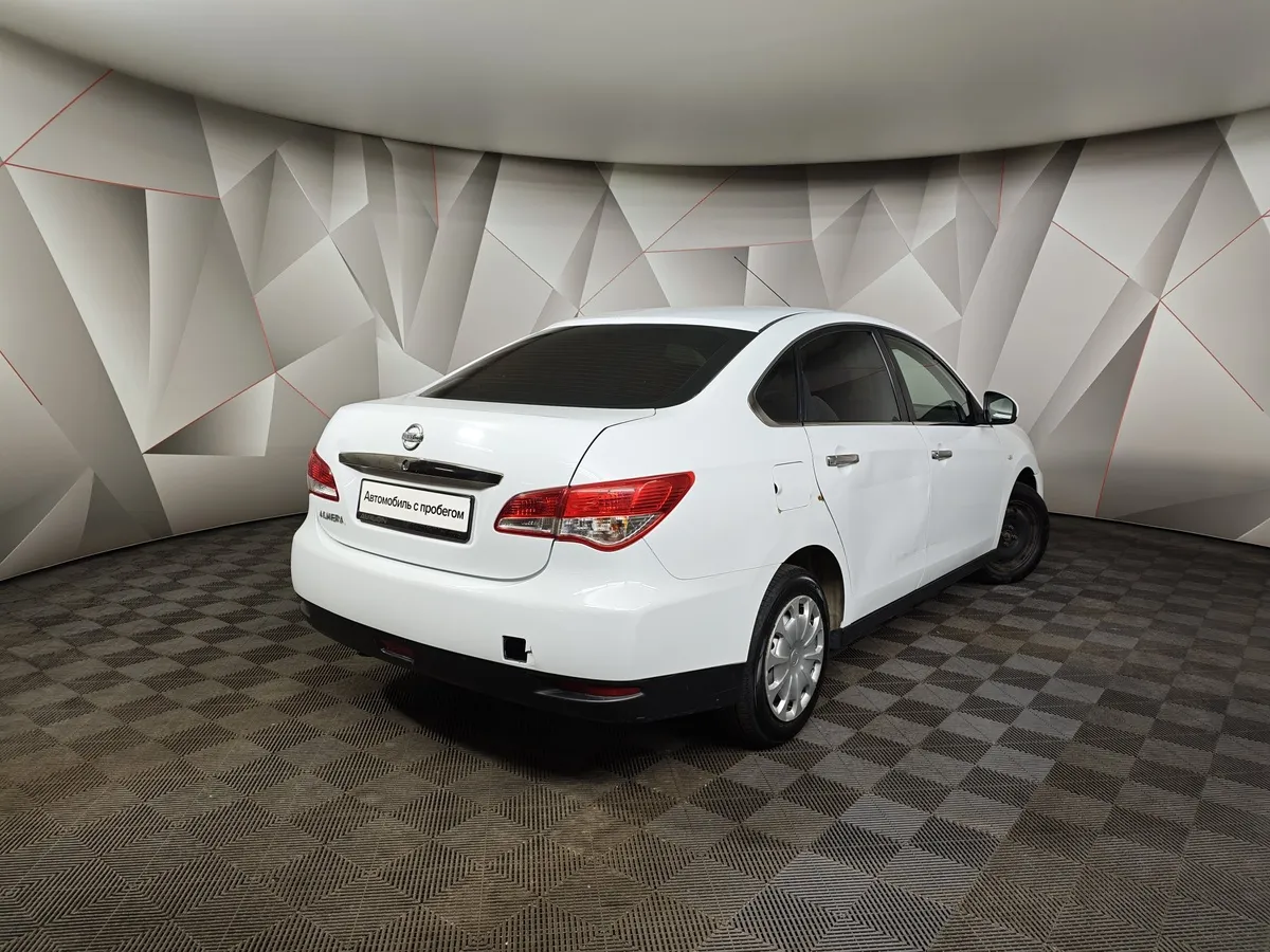 Nissan Almera 1.6 MT (102 л.с.) Белый в АВИЛОН. Слайд №2