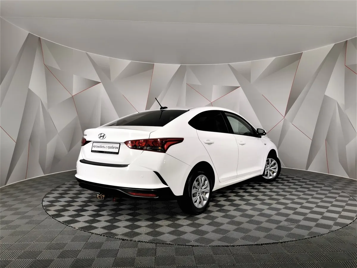 Hyundai Solaris 1.6 MT (123 л.с.) Comfort Белый в АВИЛОН. Слайд №2