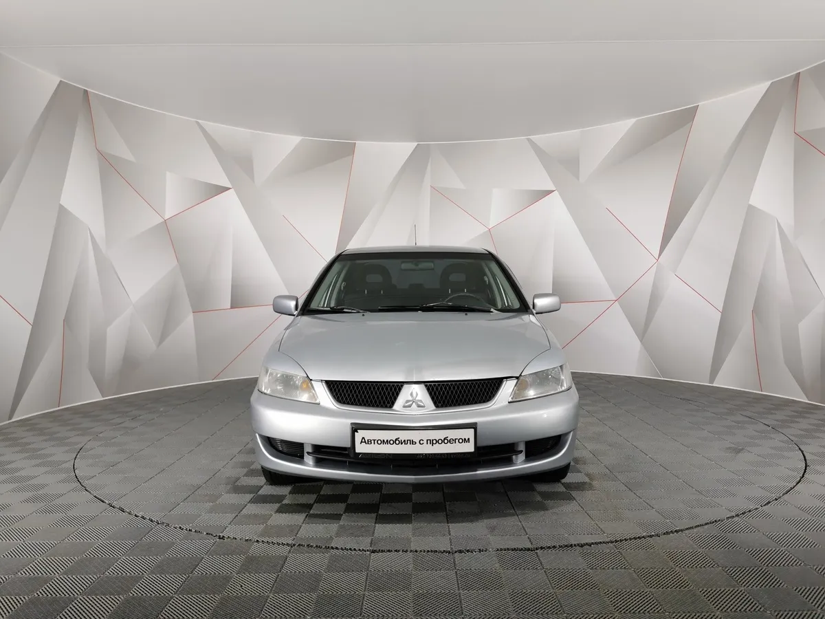 Mitsubishi Lancer 1.6 MT (98 л.с.) Серый в АВИЛОН. Слайд №7