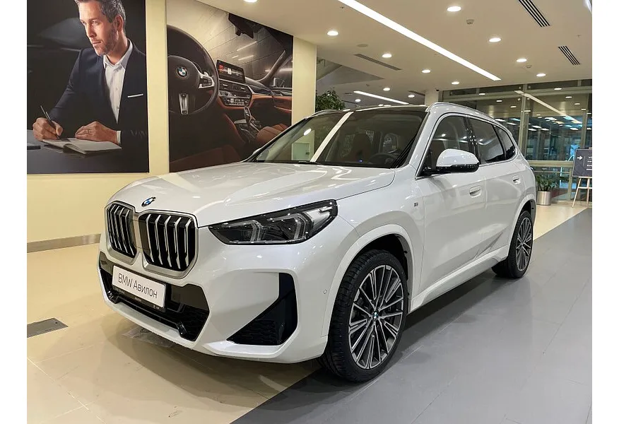 АВИЛОН - BMW X1 xDrive25 Li (204 л.с.) Белый - slide 0