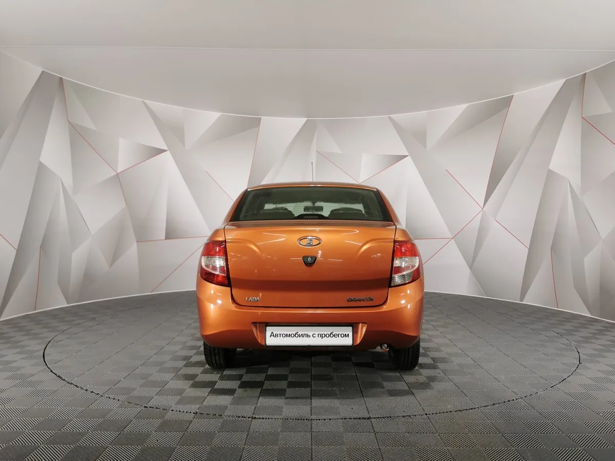 ВАЗ (Lada) Granta 1.6 AT 16кл (98 л.с.) Оранжевый в АВИЛОН. Слайд №8