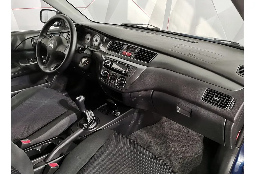 Mitsubishi Lancer 1.6 MT (100 л.с.) Синий в АВИЛОН. Слайд №12