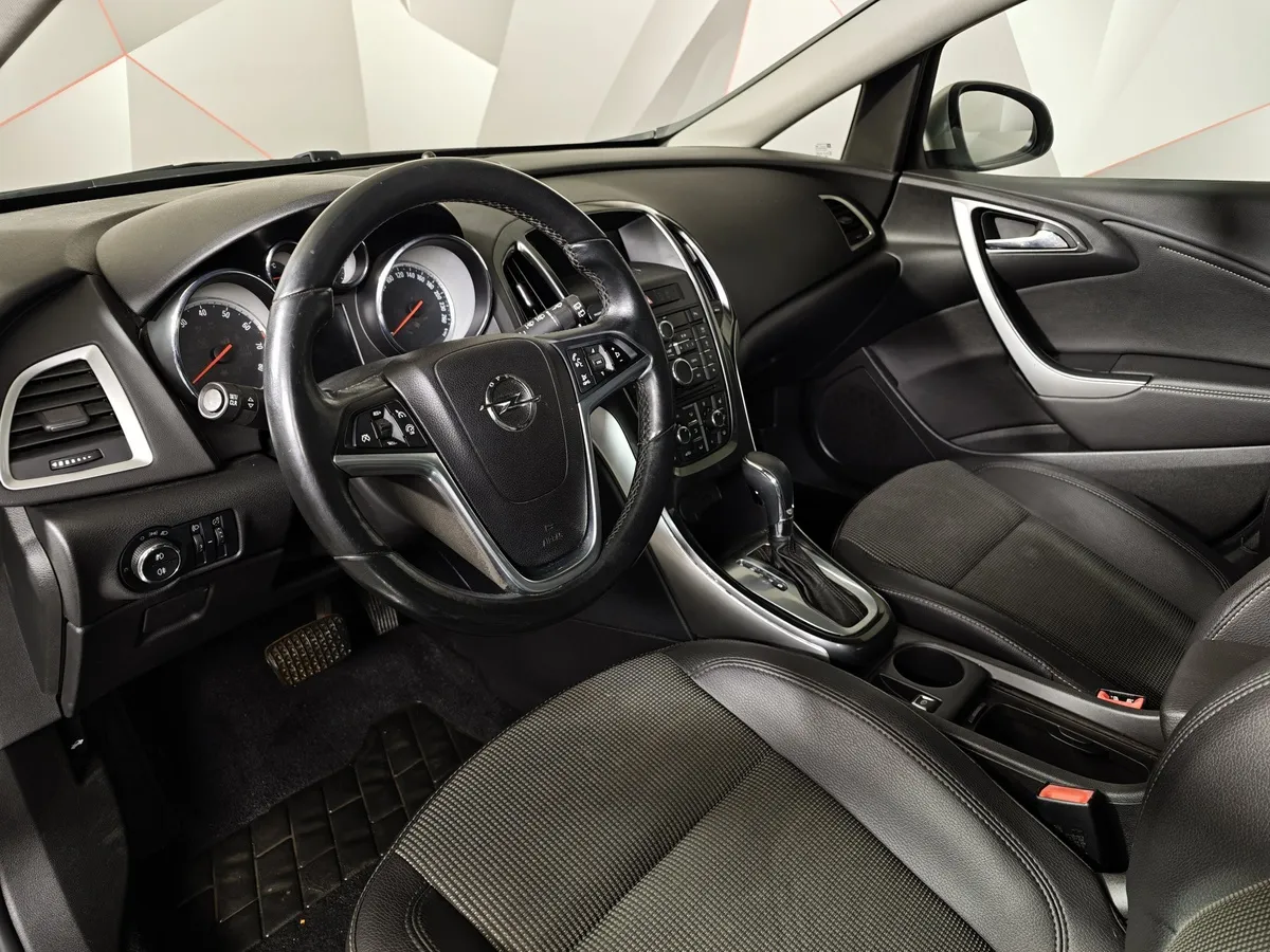 Opel Astra 1.4 Turbo AT (140 л.с.) Серебристый в АВИЛОН. Слайд №17