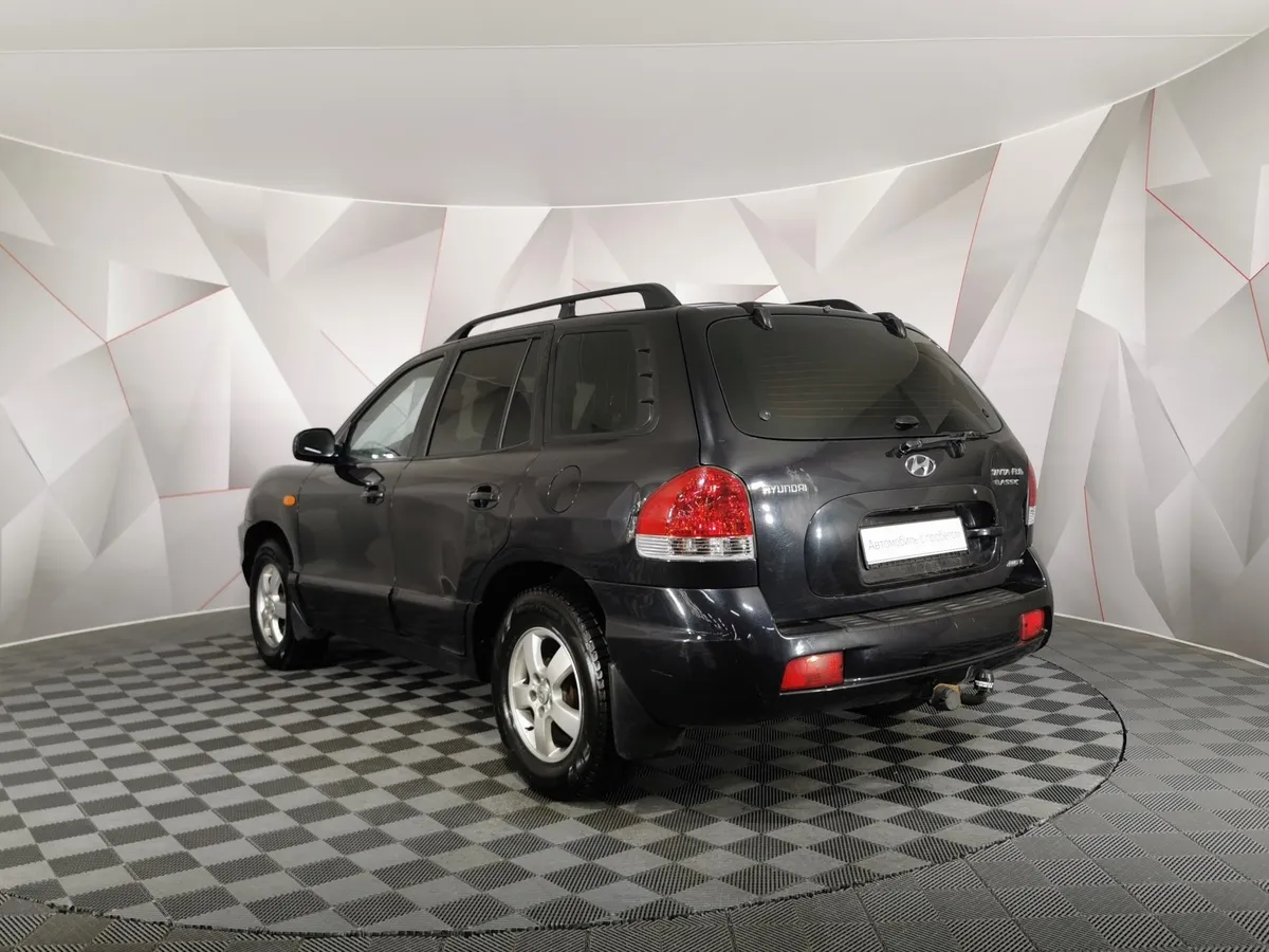 Hyundai Santa Fe 2.7 AT (173 л.с.) Черный в АВИЛОН. Слайд №4