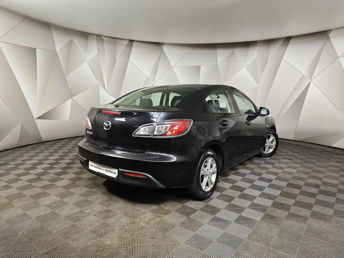 Mazda 3 1.6 AT (105 л.с.) Черный в АВИЛОН. Слайд №2